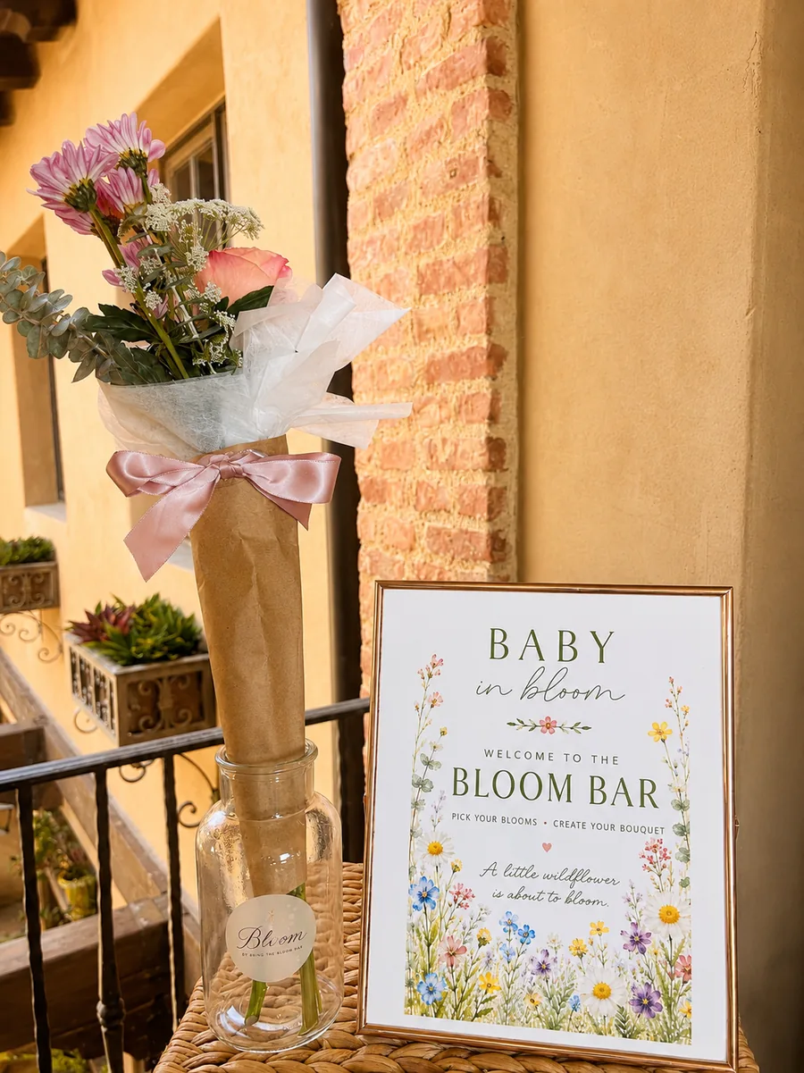 Baby shower bloom bar with wildflower sign in Orange County
